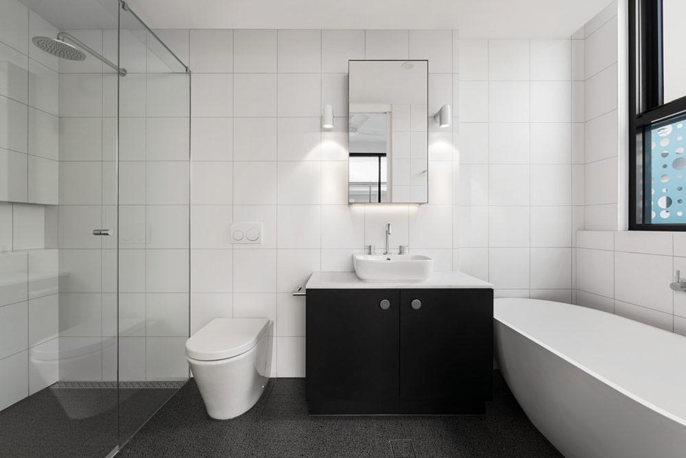 Linear drainage in bathroom.