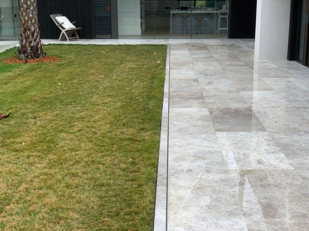 Courtyard Grate Drain and patio area.