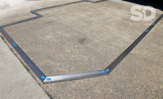 long strip drain custom made from stainless steel.