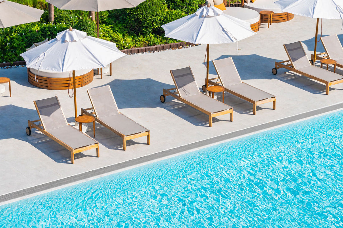 Wedge Wire Custom strip drain running along the lendgth of a hotel swimming pool.