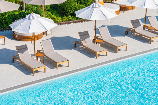 Wedge Wire Custom strip drain running along the lendgth of a hotel swimming pool.